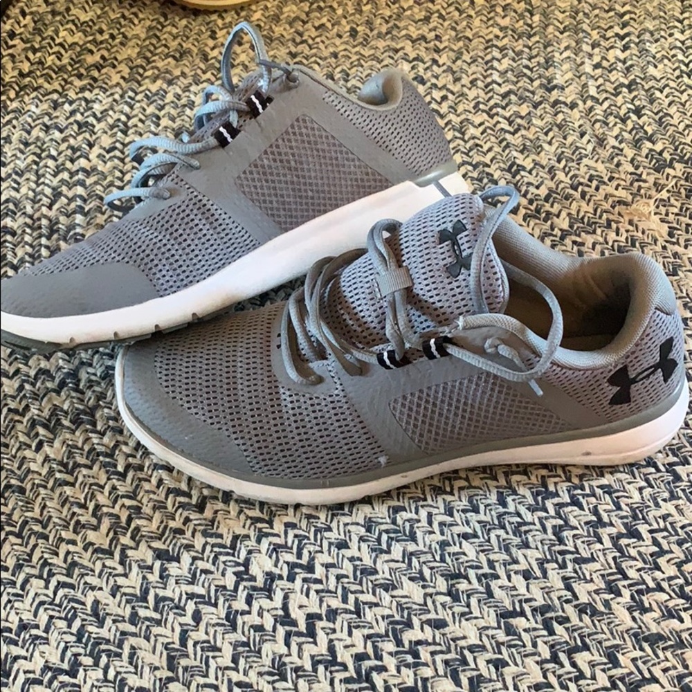 Gray Under Armour Tennis shoes.